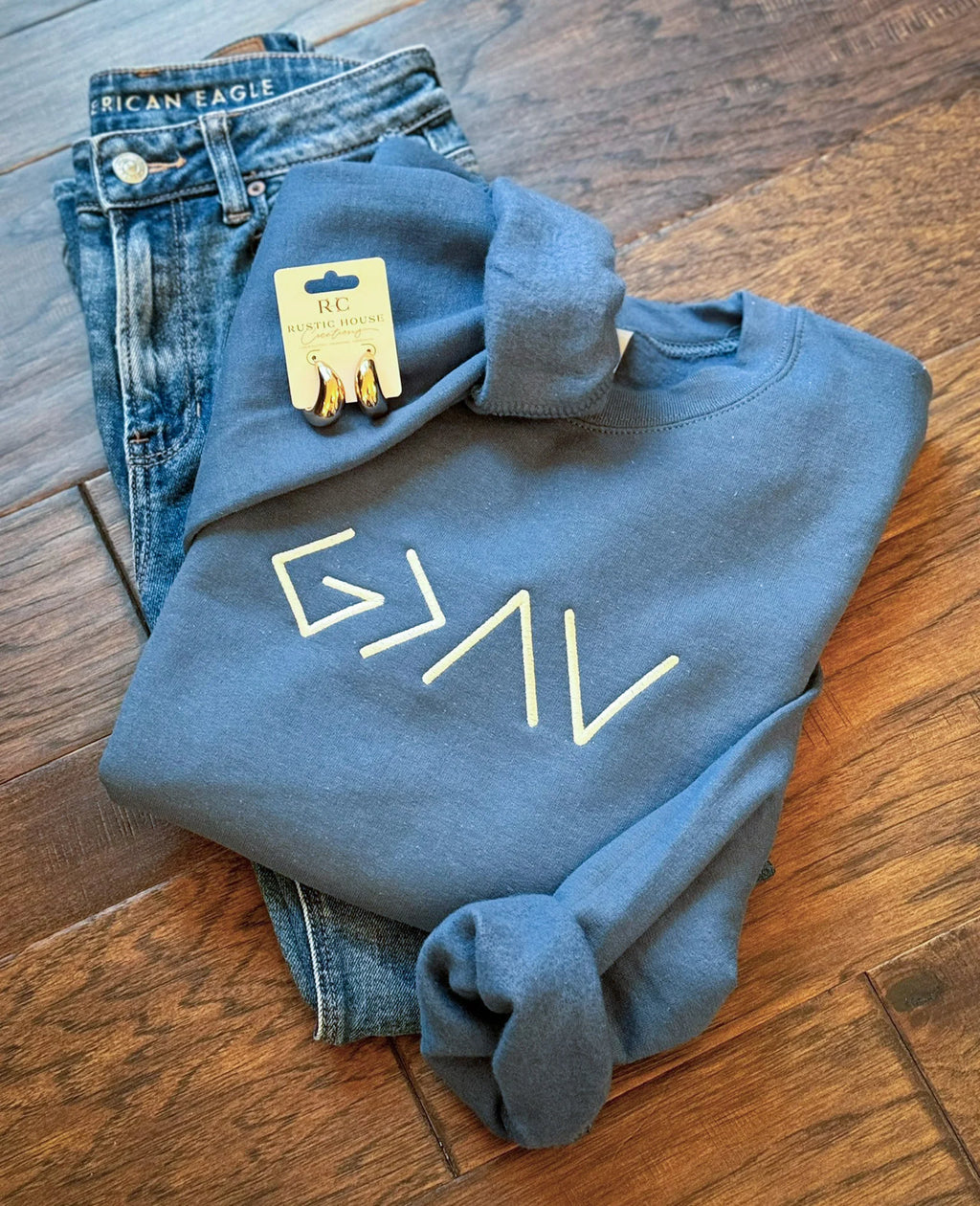 God is Greater than the Highs and Lows Embroidered Sweatshirt